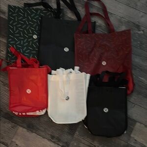 Lululemon Athletica Red and Black Tote Bags